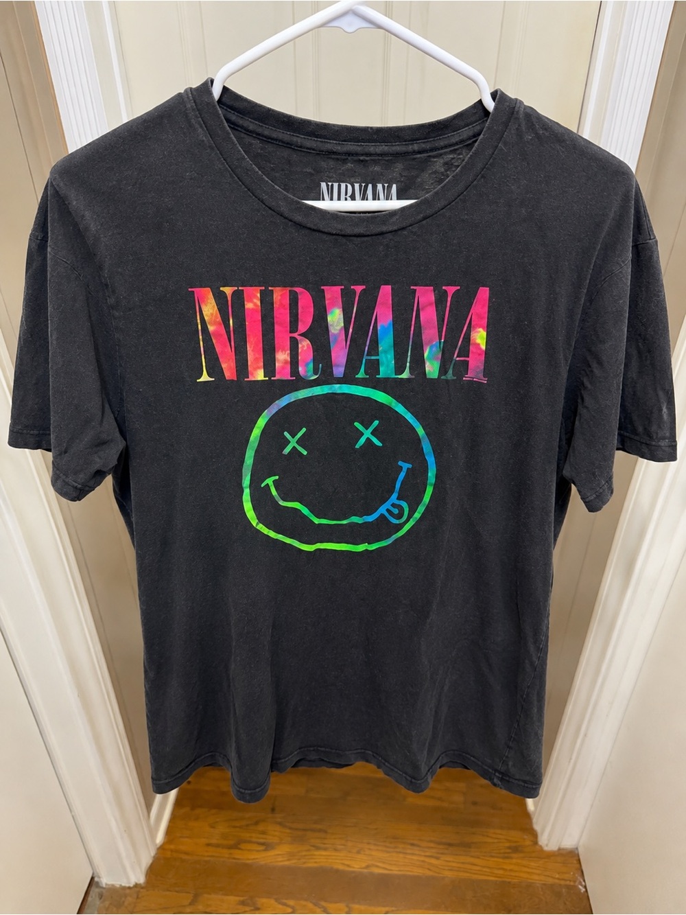 NIRVANA Black Tee with Tie-Dye Rainbow Logo and Neon Smiley